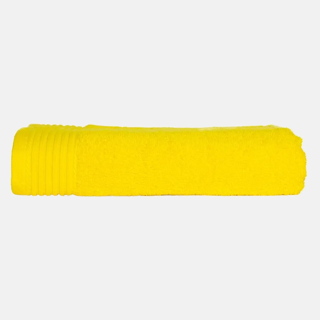 The One Badhanddoek 450 gram 70x140 Geel